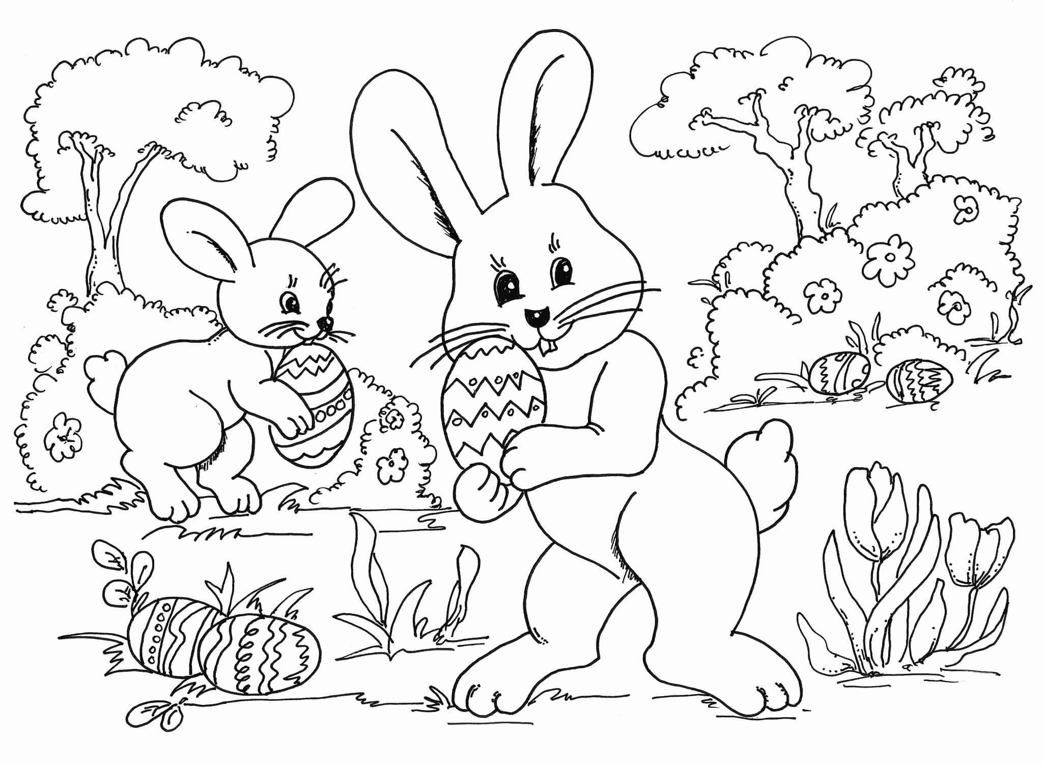 Dibujo de dos Conejitos Con Huevo de Pascua para Colorear y Imprimir