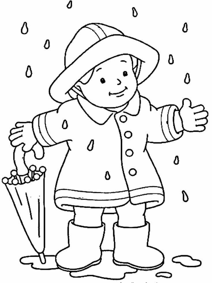 dibujos nino sosteniendo un paraguas de pie bajo la lluvia en otono para colorear